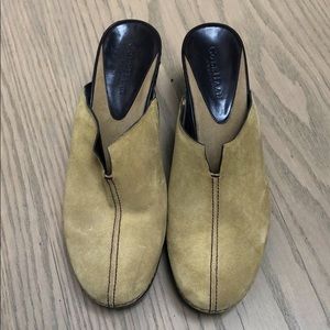 Tan suede slip on Cole Haan shoes.